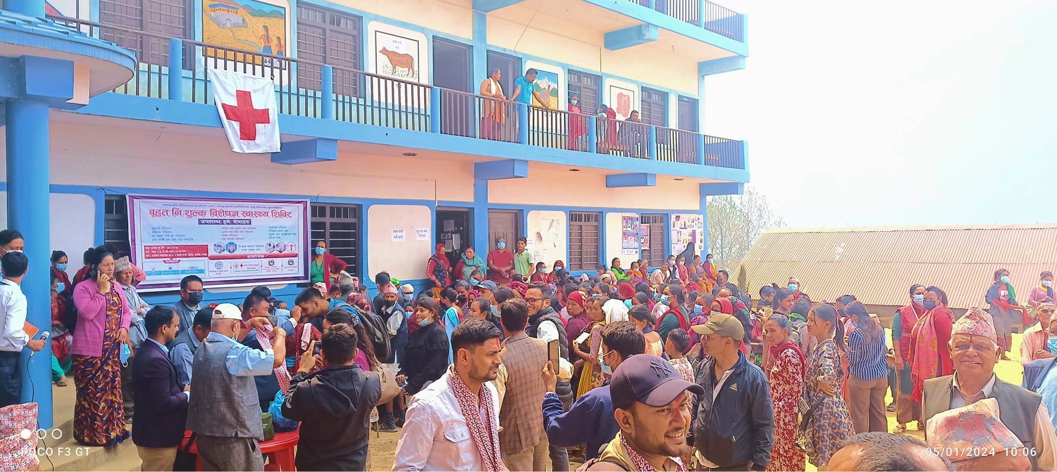 Patients gathered in front of health post